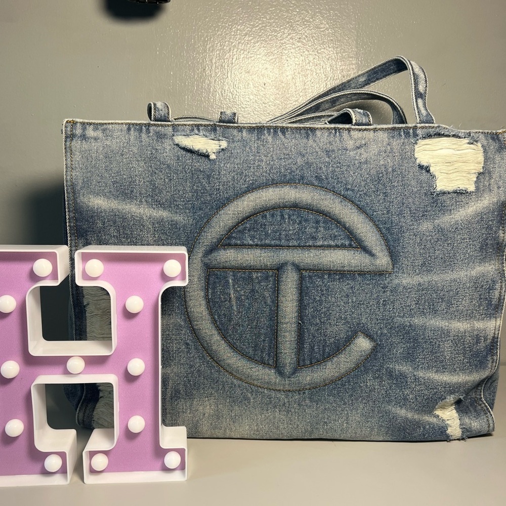 Large Telfar blue distressed denim
